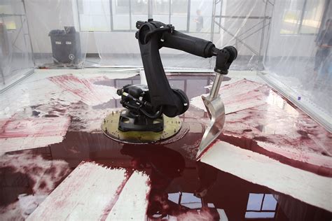 robot leaking hydraulic fluid art dies|industrial robot continuously sweeps blood